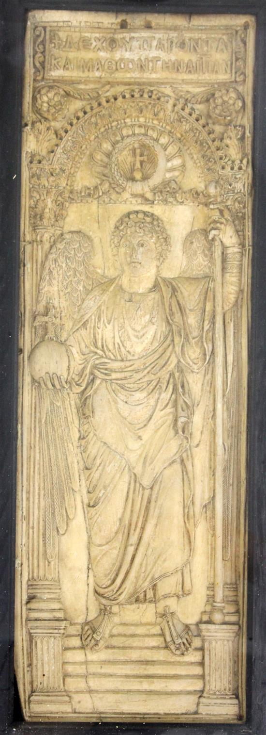 A 19th century composition replica of a 6th century ivory carving of Archangel Michael, 16 x 5in.